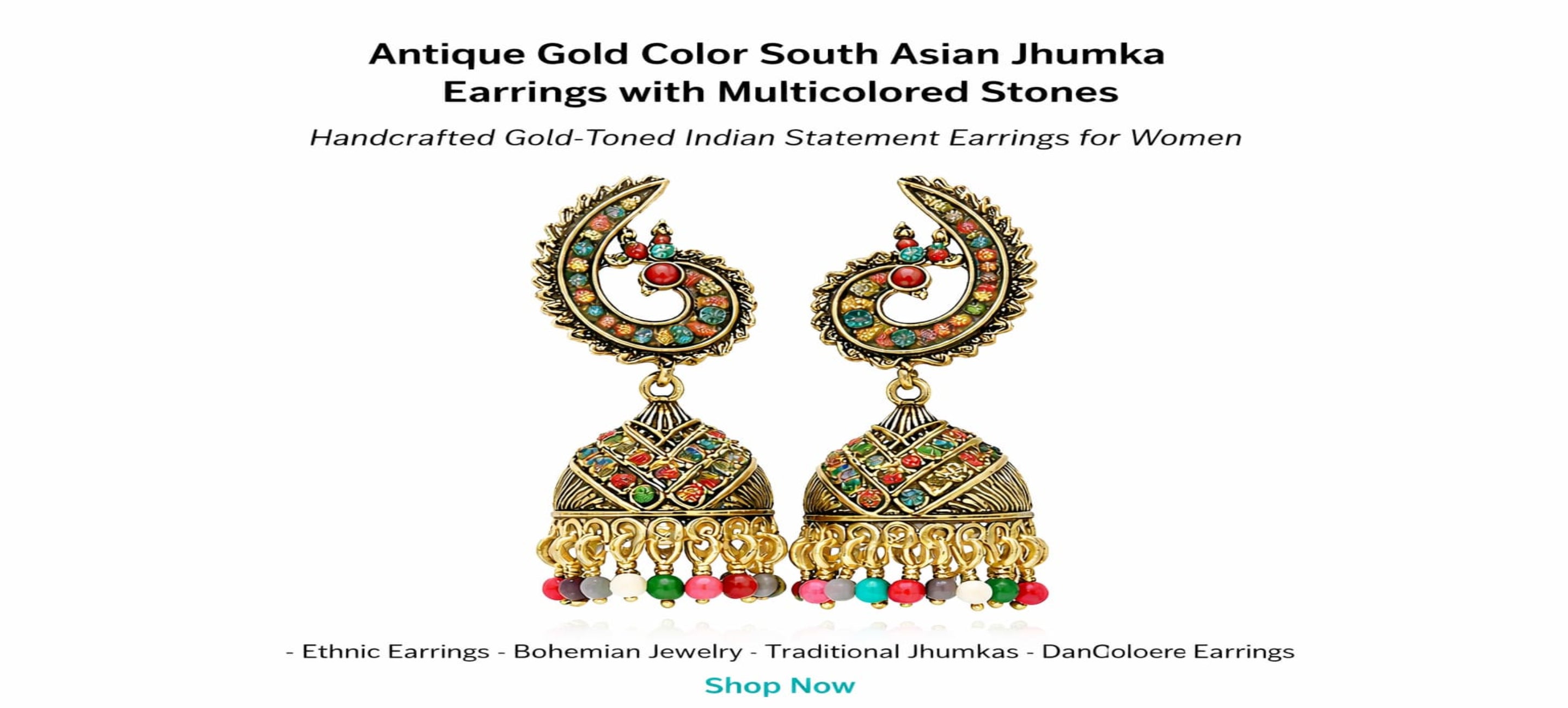 Antique gold color South Asian Jhumka earrings with multicolored stones on a white background.